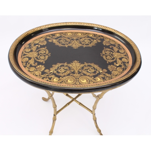 433 - An elegant Regency-style papier-mâché and gilt-brass tray-top table - early 20th century, the oval t... 