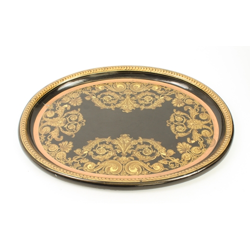 433 - An elegant Regency-style papier-mâché and gilt-brass tray-top table - early 20th century, the oval t... 