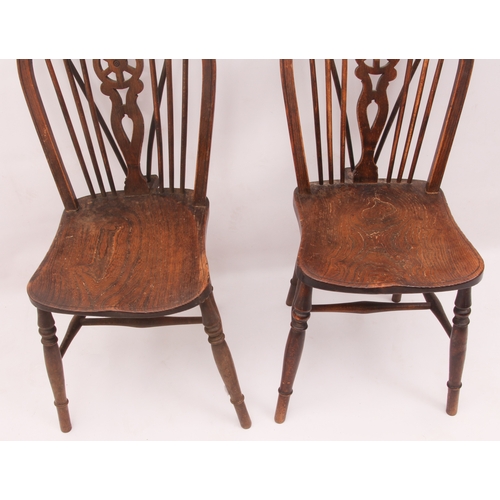 440 - Three late-19th century beech, ash and elm Windsor chairs - comprising an armchair and two similar s... 