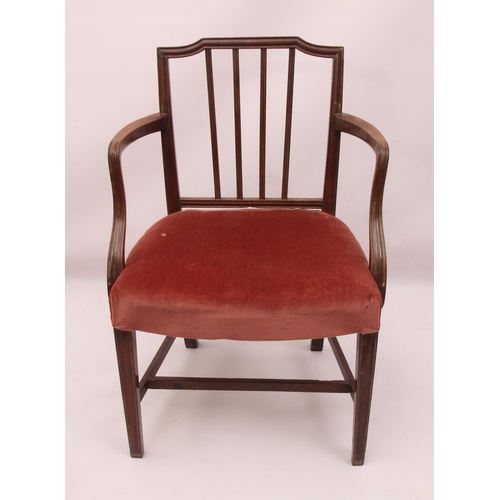 442 - A Regency mahogany elbow chair in the Hepplewhite style - the label top rail over a bar back with ce... 