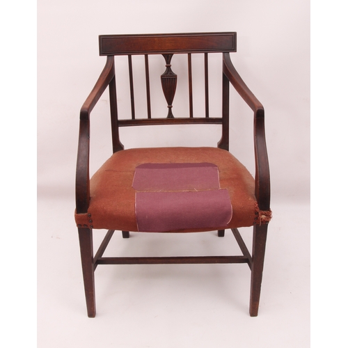 442 - A Regency mahogany elbow chair in the Hepplewhite style - the label top rail over a bar back with ce... 