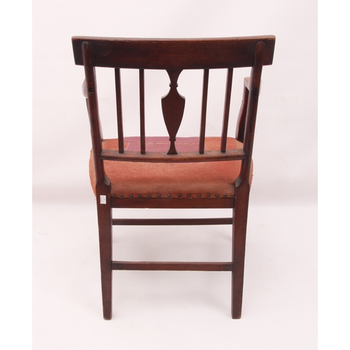 442 - A Regency mahogany elbow chair in the Hepplewhite style - the label top rail over a bar back with ce... 