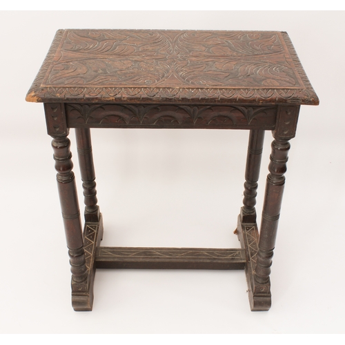 454 - A 19th century carved oak occasional table in the late-17th century style - the rectangular moulded ... 