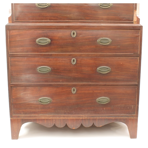 455 - An early 19th century inlaid mahogany chest on chest, probably Channel Islands - the ogee moulded fl... 