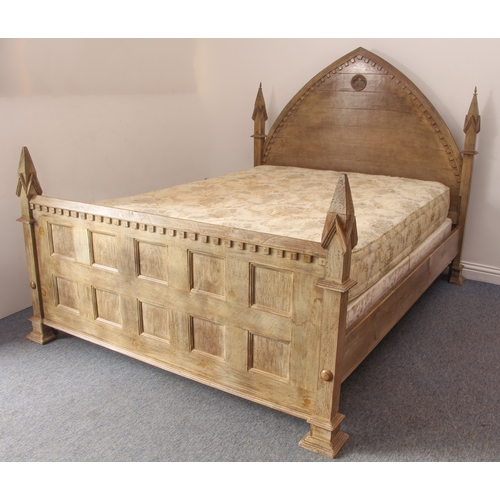 461 - An oak double bed in Gothic Revival style - (matches lots 462, 463 and 464) - late 20th century, in ... 