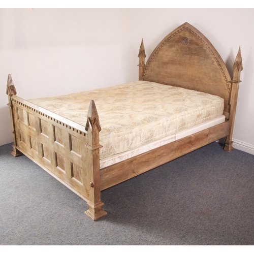 461 - An oak double bed in Gothic Revival style - (matches lots 462, 463 and 464) - late 20th century, in ... 