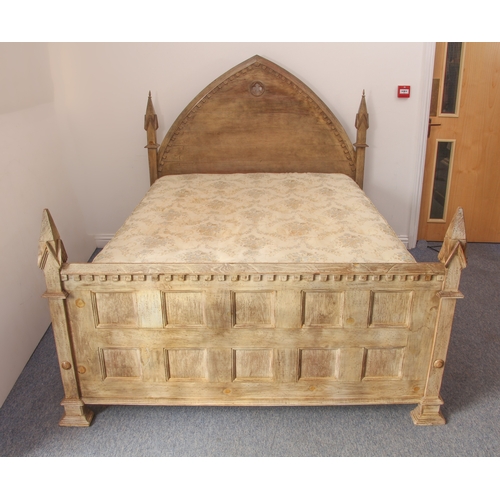 461 - An oak double bed in Gothic Revival style - (matches lots 462, 463 and 464) - late 20th century, in ... 