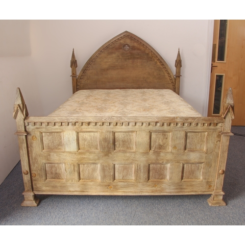 461 - An oak double bed in Gothic Revival style - (matches lots 462, 463 and 464) - late 20th century, in ... 