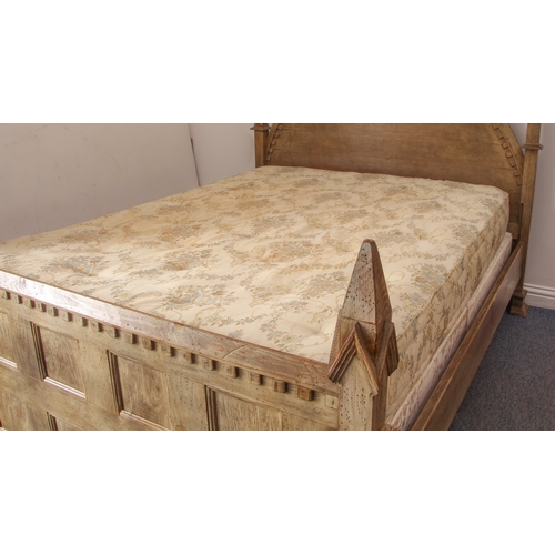 461 - An oak double bed in Gothic Revival style - (matches lots 462, 463 and 464) - late 20th century, in ... 