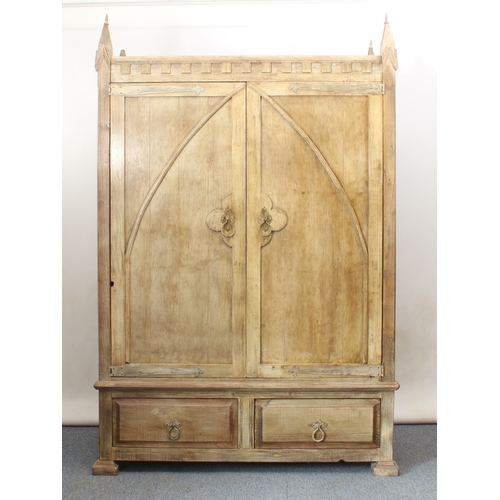 464 - An oak armoire in Gothic Revival style (matches lots 461, 462 and 463) - late 20th century, with a d... 