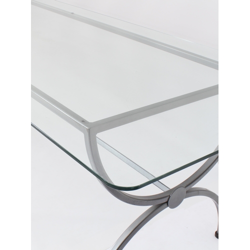 469 - A wrought iron and glass dining table of imposing proportions - modern, the rectangular glass top wi... 