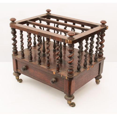 477 - A Regency rosewood Canterbury - rectangular form with three divisions, the frame raised on turned an... 