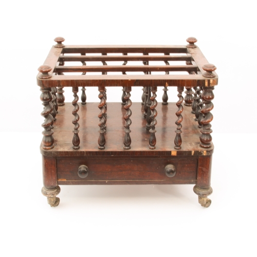 477 - A Regency rosewood Canterbury - rectangular form with three divisions, the frame raised on turned an... 