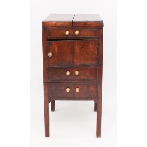 490 - A George III mahogany night or close table - the two-part hinged top revealing an interior with wash... 