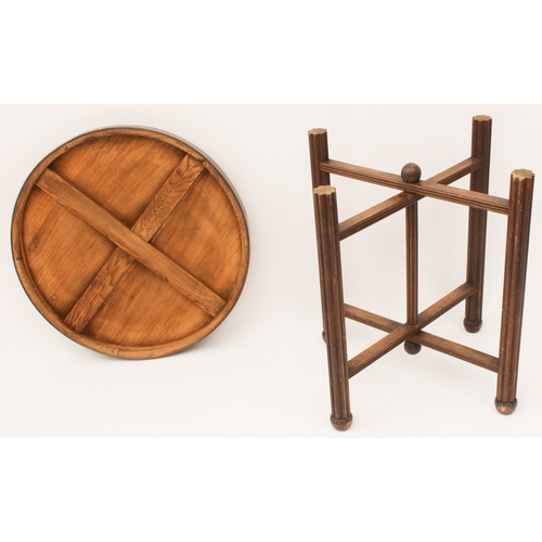 497 - A Persian tiffin table with folding turned wooden stand