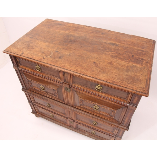 503 - A William and Mary oak and walnut veneered two-part chest of drawers - the top with applied edge mou... 