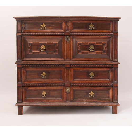 503 - A William and Mary oak and walnut veneered two-part chest of drawers - the top with applied edge mou... 