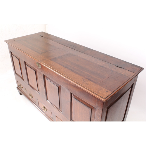 507 - A George III oak and mahogany crossbanded mule chest - the hinged top with two mahogany crossbanded ... 