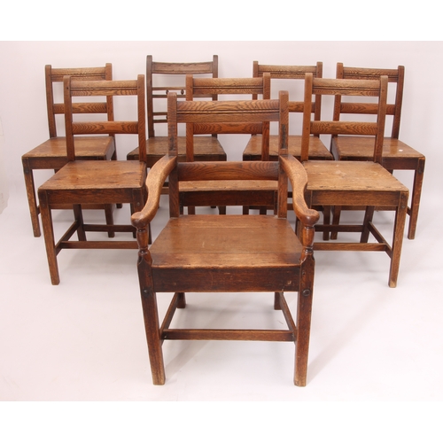 508 - A set of seven early 19th century provincial oak dining chairs - including one carver; plus a simila... 