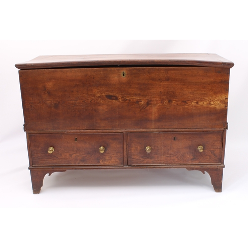 509 - A George III elm two-part mule chest - the moulded, cleated top on iron strap hinges, raised on a tw... 