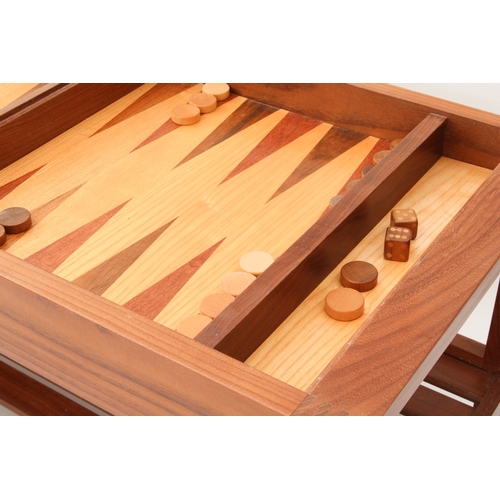 511 - A modern teak, light oak and coromandel backgammon coffee table - with two-part inlaid gaming board ... 