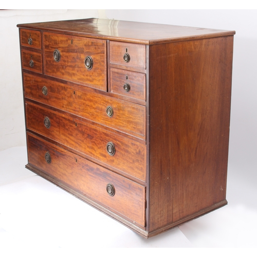 523 - A Regency satinwood crossbanded mahogany secretaire-chest - the plain top over two banks of two shor... 