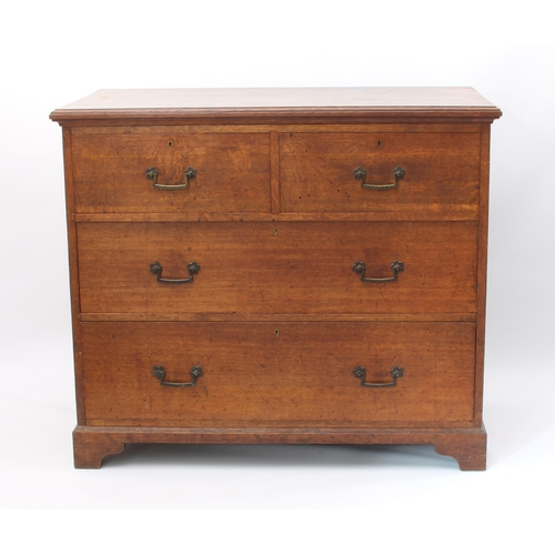 524 - A Victorian oak chest of drawers - the moulded top over two short and two long graduated drawers wit... 