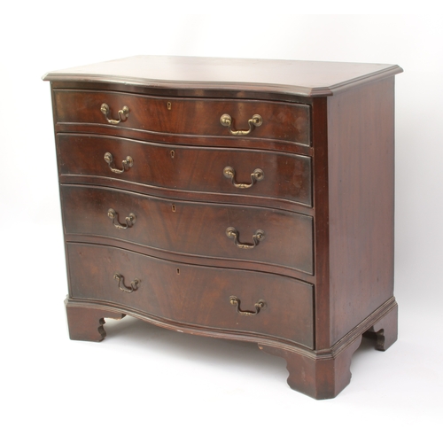 527 - A George III style serpentine mahogany chest of drawers - first half 20th century, the moulded top o... 