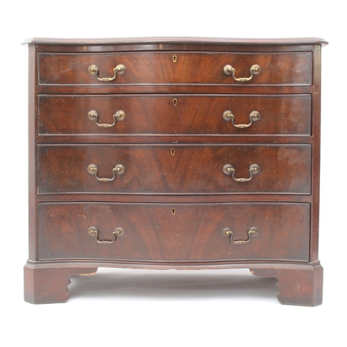 527 - A George III style serpentine mahogany chest of drawers - first half 20th century, the moulded top o... 