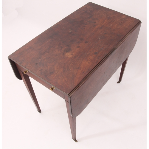 528 - A George III mahogany Pembroke table - the rectangular top with rounded angles, over a single end-dr... 