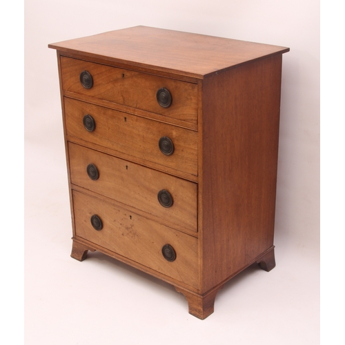 529 - A mid-19th century mahogany chest of drawers of small proportions - the reeded top over four graduat... 