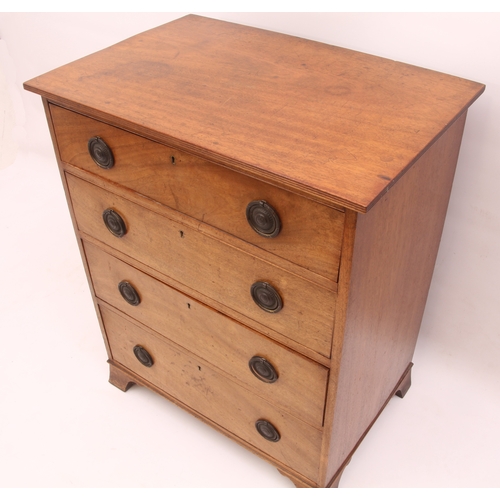 529 - A mid-19th century mahogany chest of drawers of small proportions - the reeded top over four graduat... 