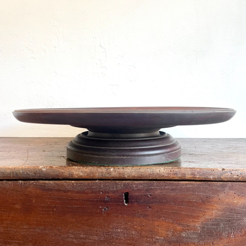 530 - A Georgian-style mahogany Lazy Susan - mid-20th century, the dished top on a turned swivel base with... 