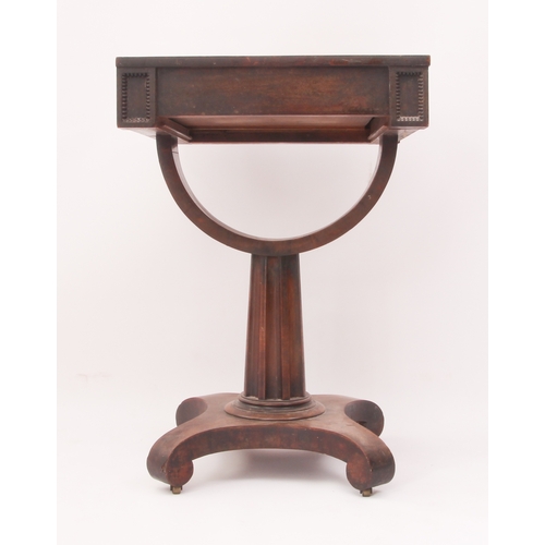 535 - A William IV mahogany work table - the crossbanded rectangular top over a frieze drawer with reel mo... 