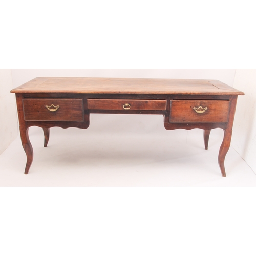 537 - A 19th century French chestnut and beech writing table - the cleated rectangular top over three draw... 