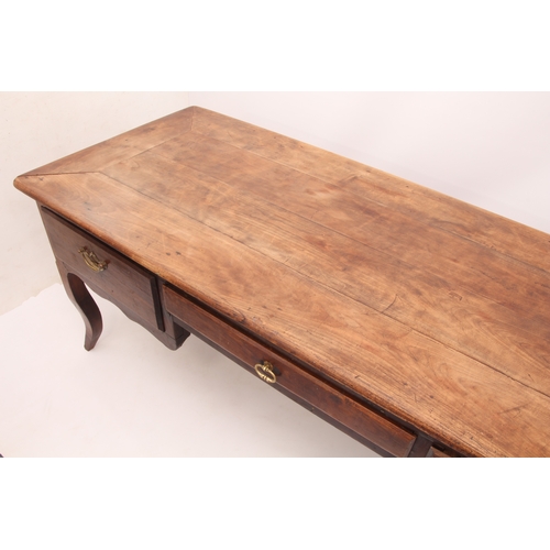 537 - A 19th century French chestnut and beech writing table - the cleated rectangular top over three draw... 