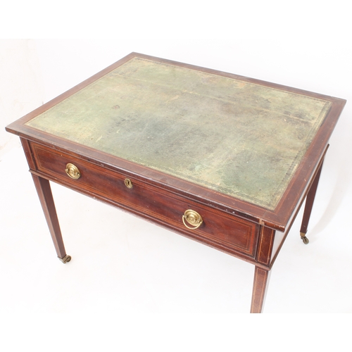 539 - A Regency mahogany writing table - the rectangular top with barber's pole banding and inset tooled g... 