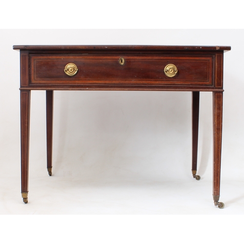 539 - A Regency mahogany writing table - the rectangular top with barber's pole banding and inset tooled g... 