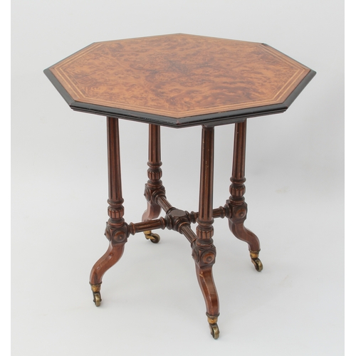 541 - A good quality late-Victorian amboyna, walnut and ebonised centre table in the Aesthetic taste - the... 