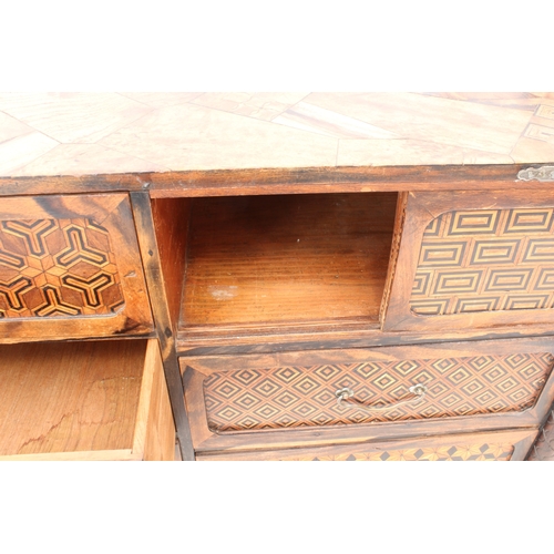 542 - A Japanese parquetry and specimen-wood cabinet - c.1900, the rectangular top with fretwork gallery, ... 