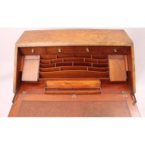 544 - A 1930s burr walnut bureau with mechanical interior mechanism - the quarter veneered fall opening to... 