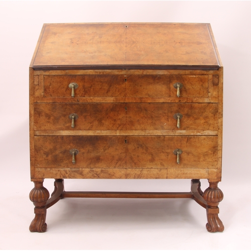 544 - A 1930s burr walnut bureau with mechanical interior mechanism - the quarter veneered fall opening to... 