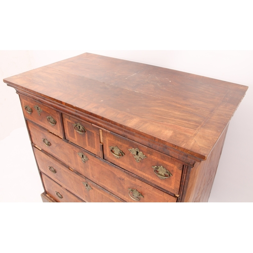 545 - A George I and later crossbanded walnut chest of drawers - probably originally the top of a chest-on... 