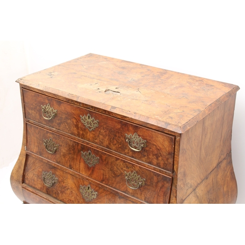 546 - A Dutch 18th century burr and figured walnut bombe chest-of-drawers - the bevelled top over four coc... 