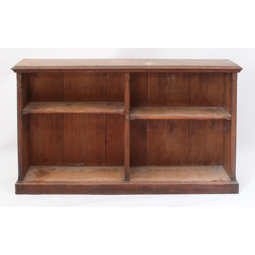 547 - A late-Victorian oak low open bookcase - the moulded top over a two-sided bookcase section, each sid... 