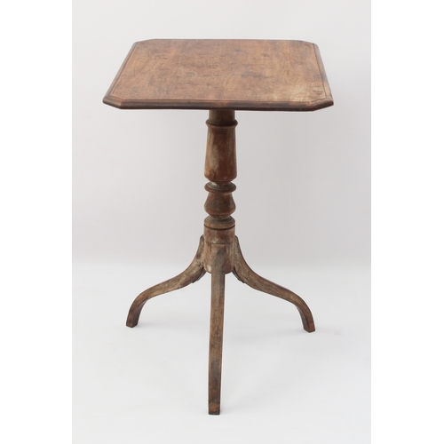 549 - A George III mahogany tilt-top tripod table - the moulded rectangular top with clipped corners, on a... 