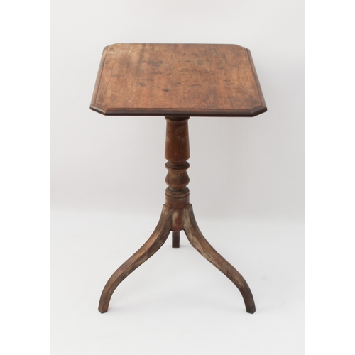 549 - A George III mahogany tilt-top tripod table - the moulded rectangular top with clipped corners, on a... 