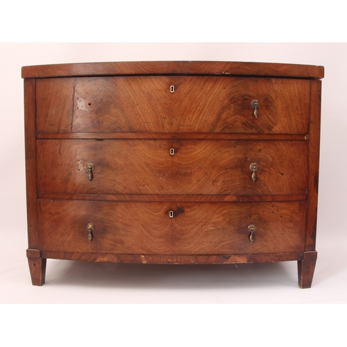 551 - A French 19th century bowfront mahogany chest - the flame mahogany top over three long graduated dra... 