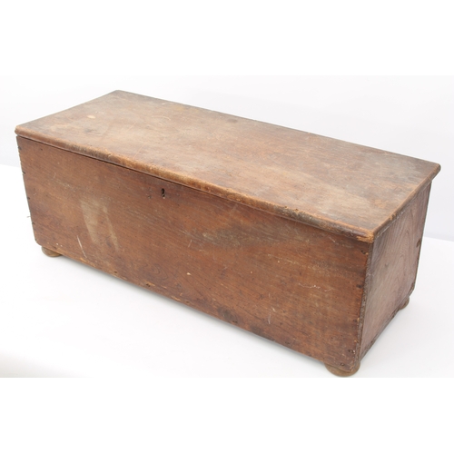 552 - A 19th century boarded elm chest - rectangular form with the original wrought-iron strap hinges, int... 