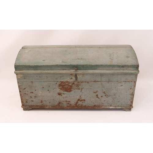 553 - A 19th century painted pine dome-top trunk - in pale blue, with iron carrying handles, the interior ... 